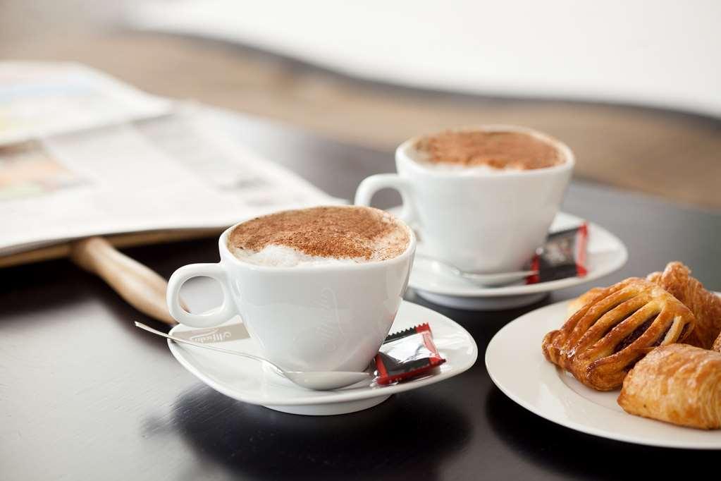 Hotel Occidental Praha Wilson Amenities foto A cup of cappuccino