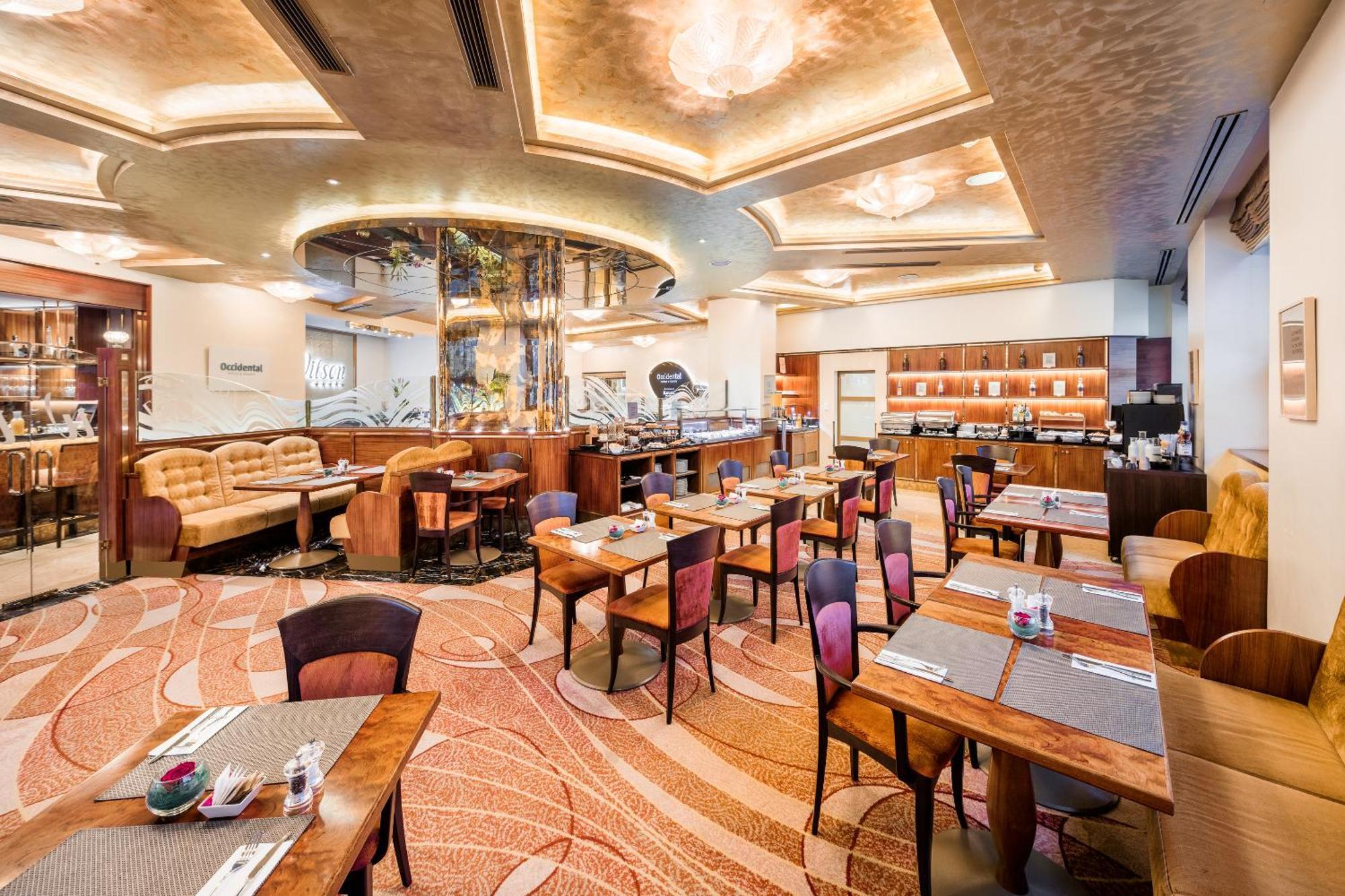 Hotel Occidental Praha Wilson Esterno foto The restaurant