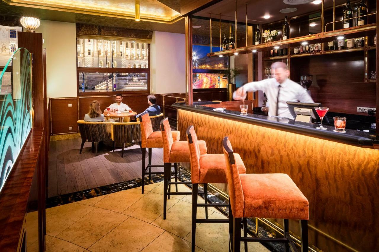 Hotel Occidental Praha Wilson Esterno foto The bar at the Mandarin Oriental, Munich
